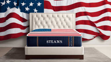 A luxurious Stearns & Foster mattress with an American flag draped over it and a Memorial Day Sale sign with $900 off prominently displayed.