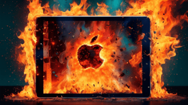 An Apple iPad Air with a cracked screen displaying a 9-core graphics processing unit engulfed in flames.